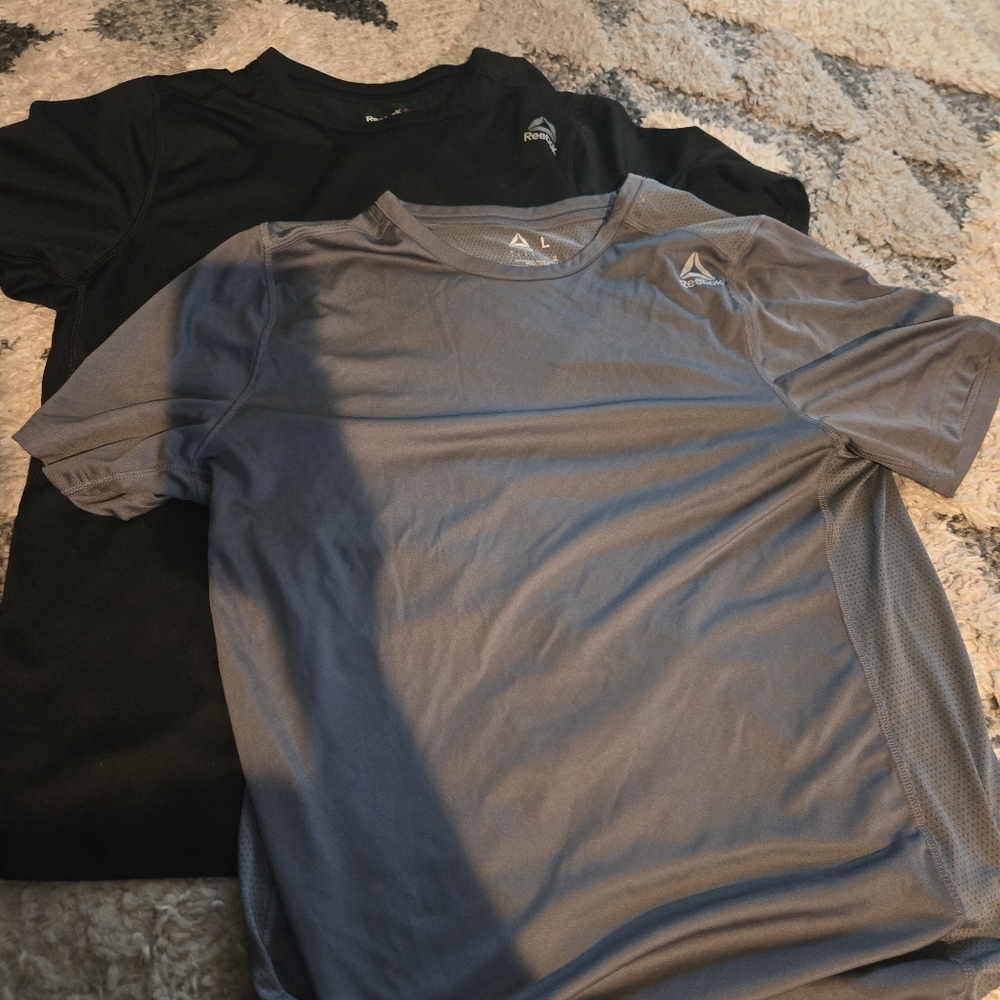 Set of 2 reebok large workout shirts
